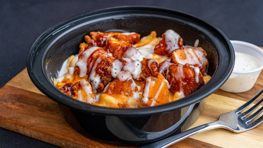 The Overload Bowl with mac and cheese, fries, chicken tenders