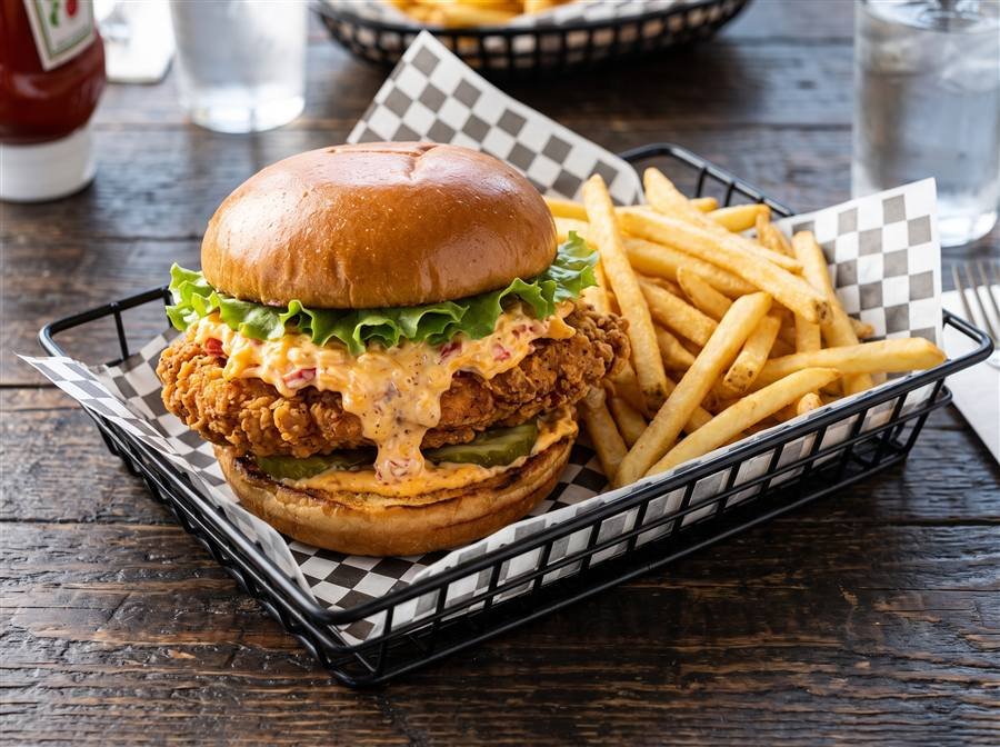 Fried chicken sandwich with fries